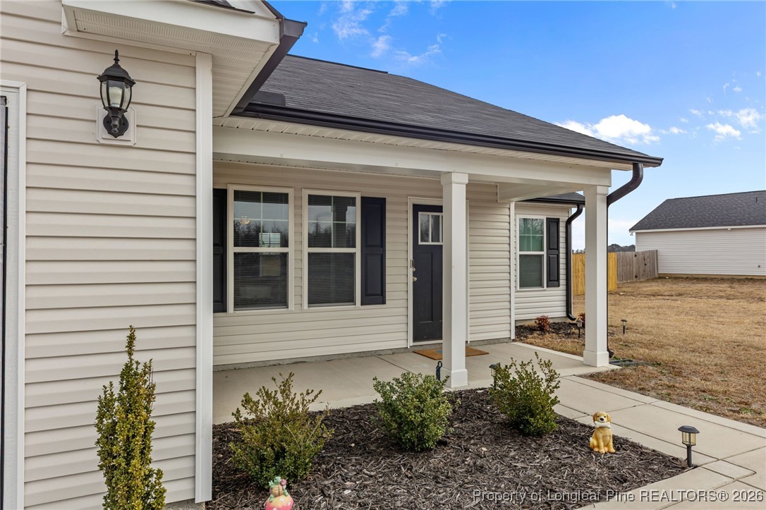 522 Carolina Church Road St. Pauls, NC 28384 - Photo 36 of 36 a view of a entryway door front of house