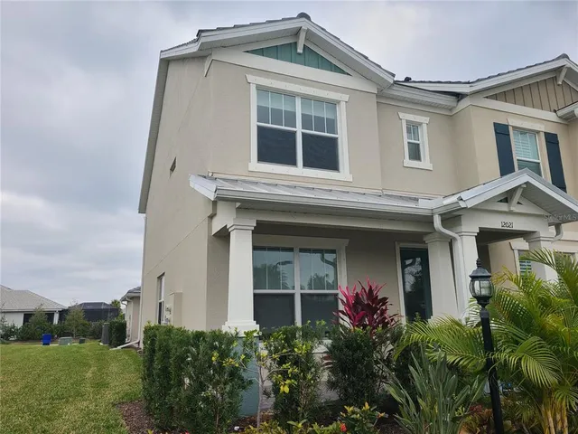 a front view of a house with an outdoor space