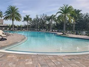 a view of a backyard with sitting area and furniture