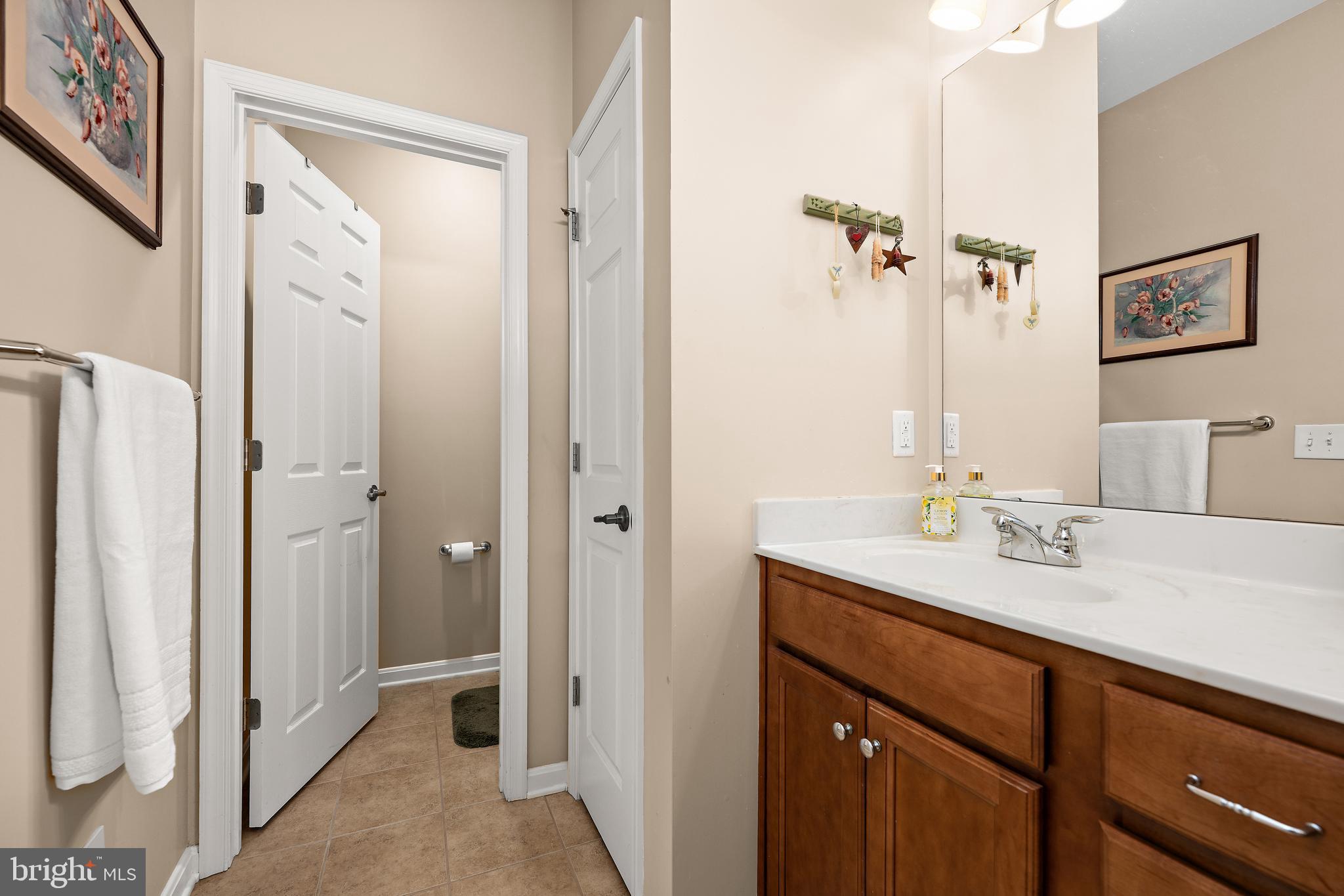16635 Shoal Road Lewes, DE 19958 - Photo 20 of 60 Primary Bathroom with Linen Closet
