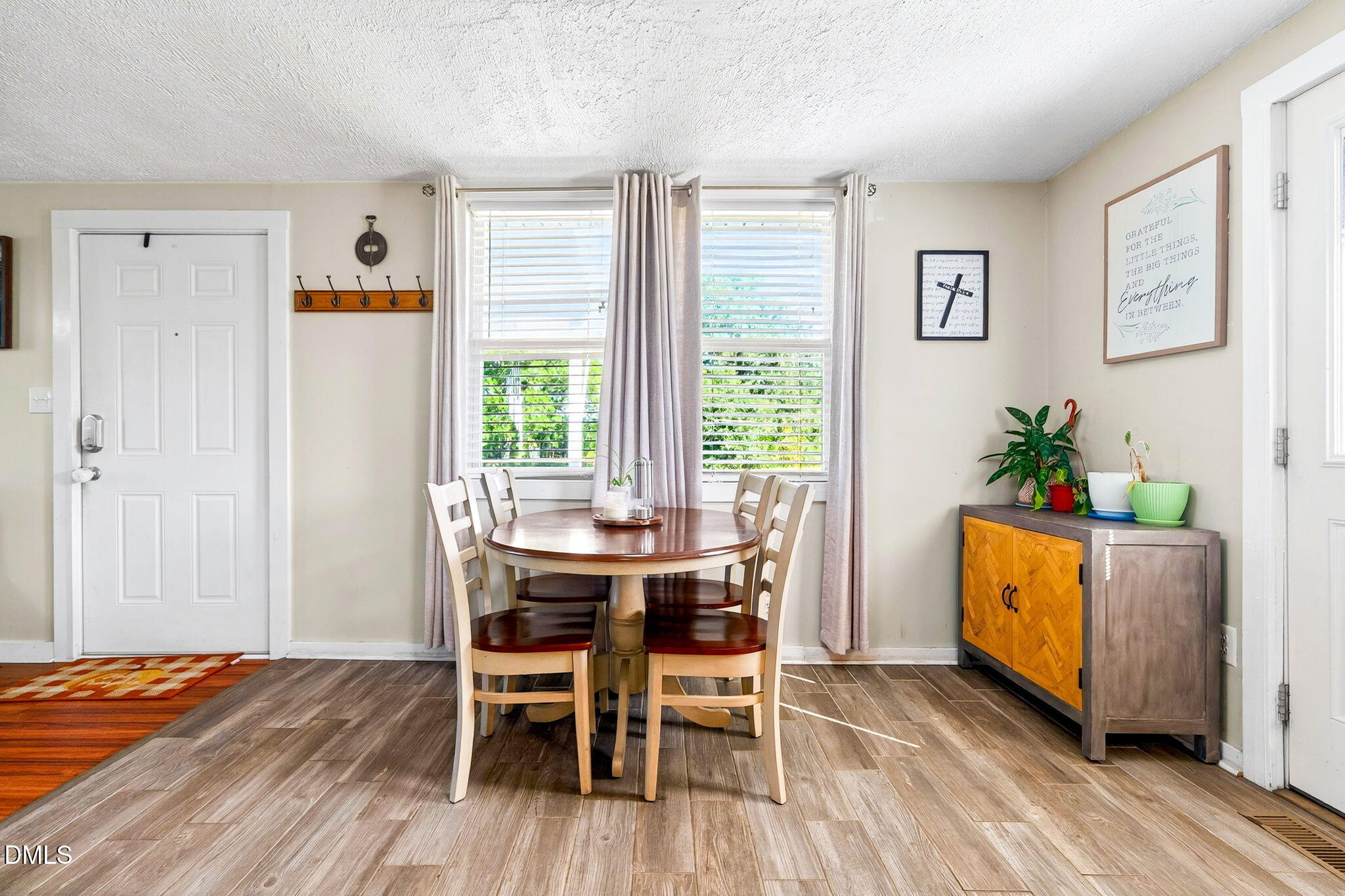 334 Perry Curtis Road Zebulon, NC 27597 - Photo 16 of 38 a dining room with furniture and window