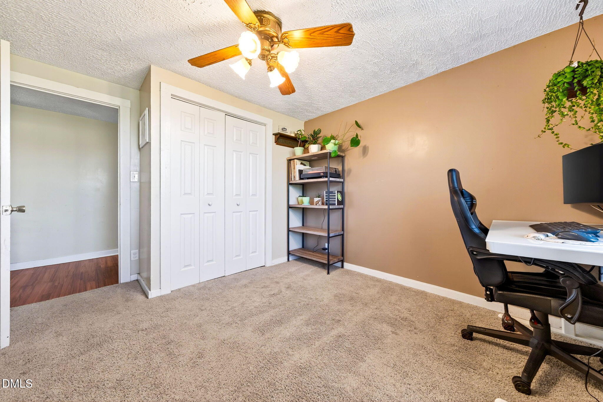 334 Perry Curtis Road Zebulon, NC 27597 - Photo 22 of 38 a view of a workspace with furniture