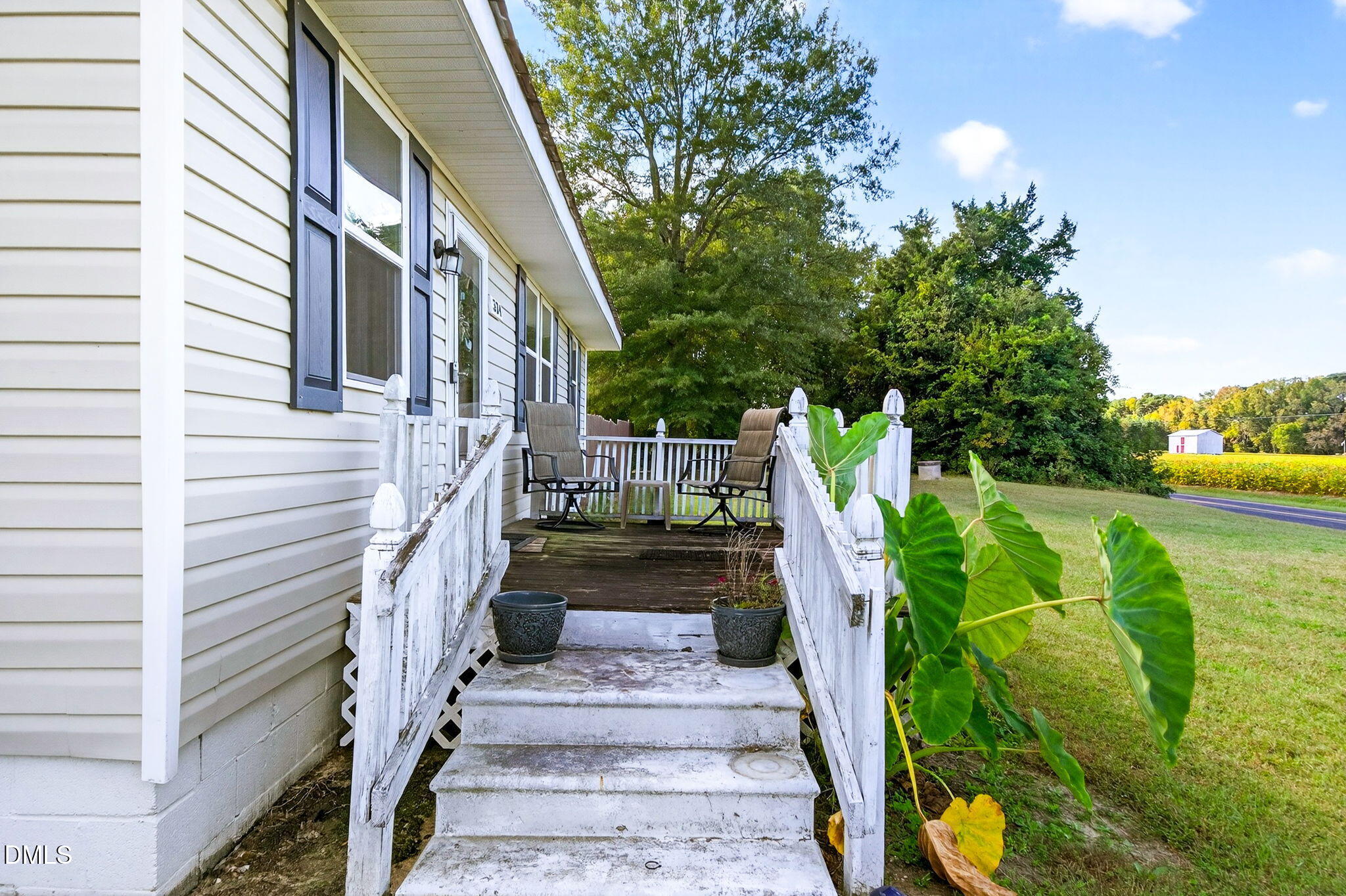 334 Perry Curtis Road Zebulon, NC 27597 - Photo 4 of 38 a view of a house with backyard
