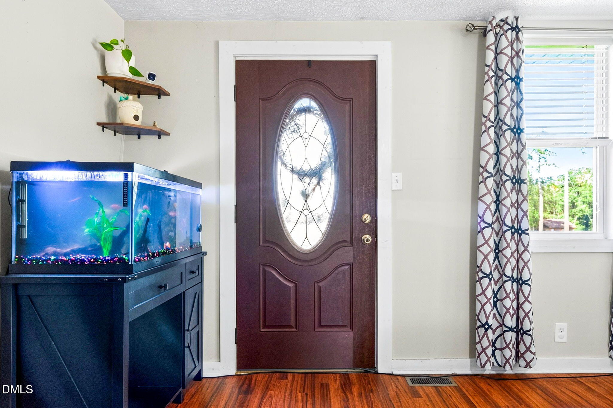 334 Perry Curtis Road Zebulon, NC 27597 - Photo 9 of 38 a view of entryway with wooden floor