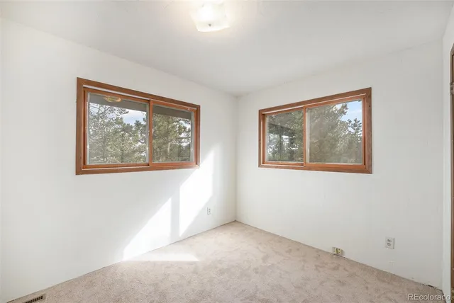 a view of an empty room with window