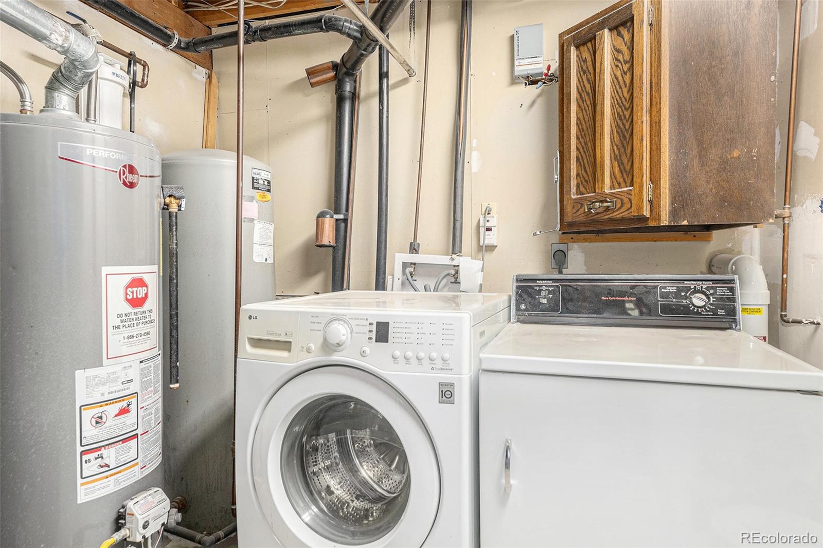 11540 Inspiration Road Golden, CO 80403 - Photo 20 of 33 a utility room with dryer and washer