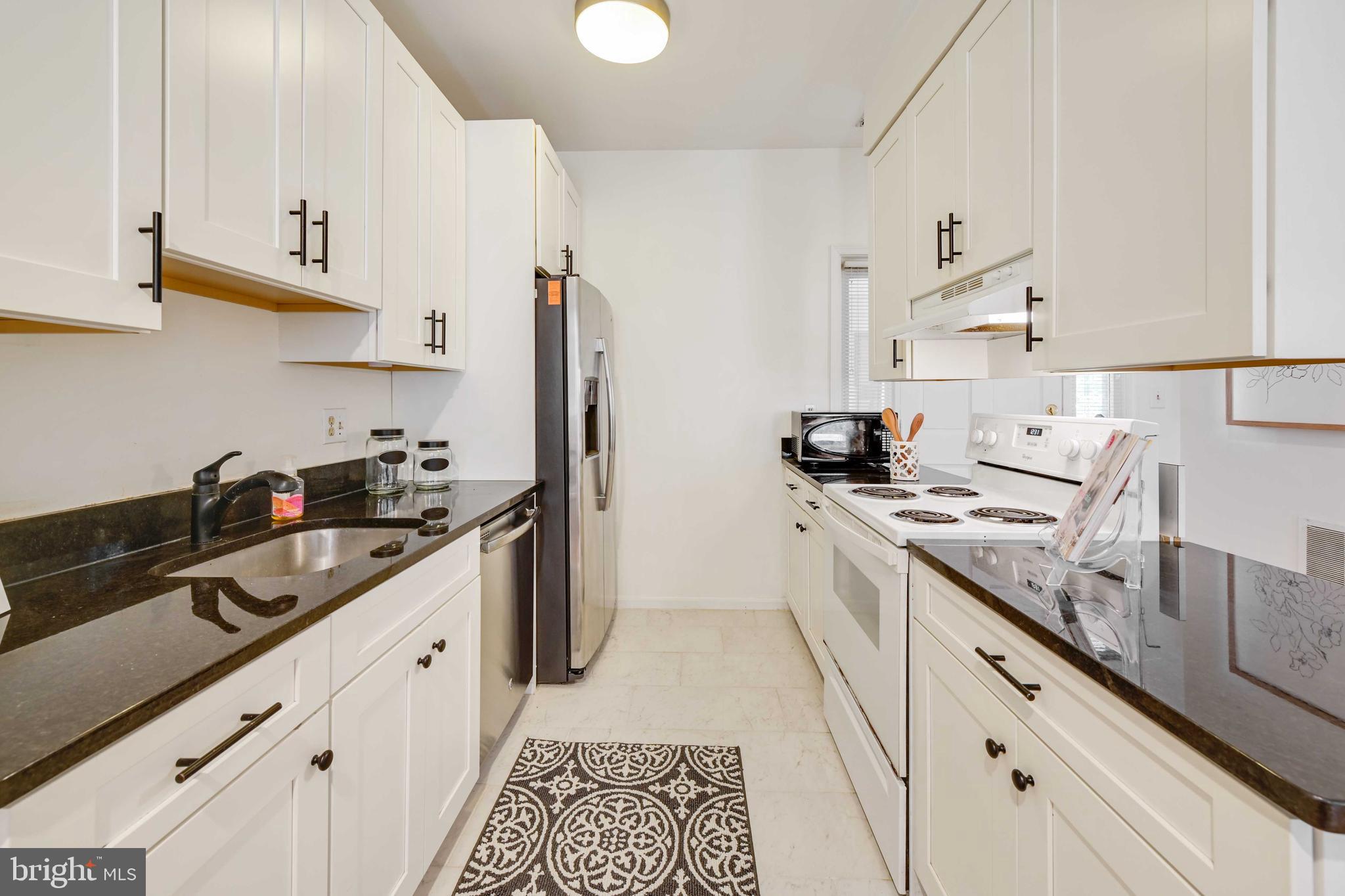 4202 Roland Avenue, Unit 104 Baltimore, MD 21211 - Photo 13 of 37 Bright kitchen