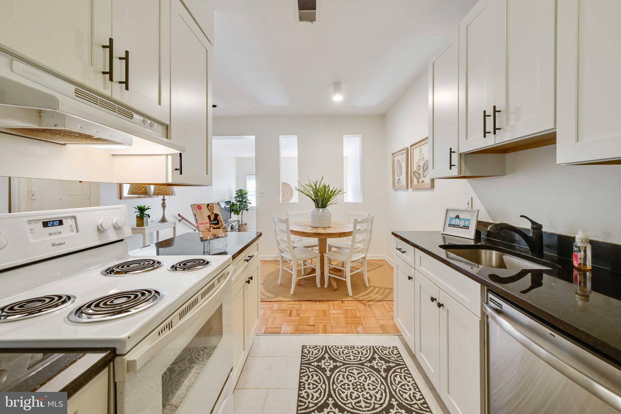 4202 Roland Avenue, Unit 104 Baltimore, MD 21211 - Photo 15 of 37 Kitchen looking towards dining area