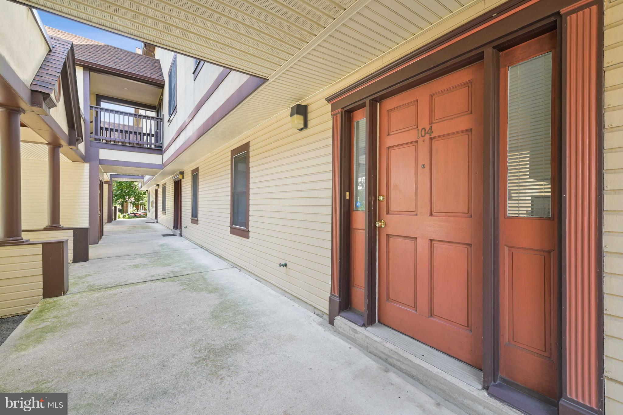 4202 Roland Avenue, Unit 104 Baltimore, MD 21211 - Photo 4 of 37 Front door of Unit 104