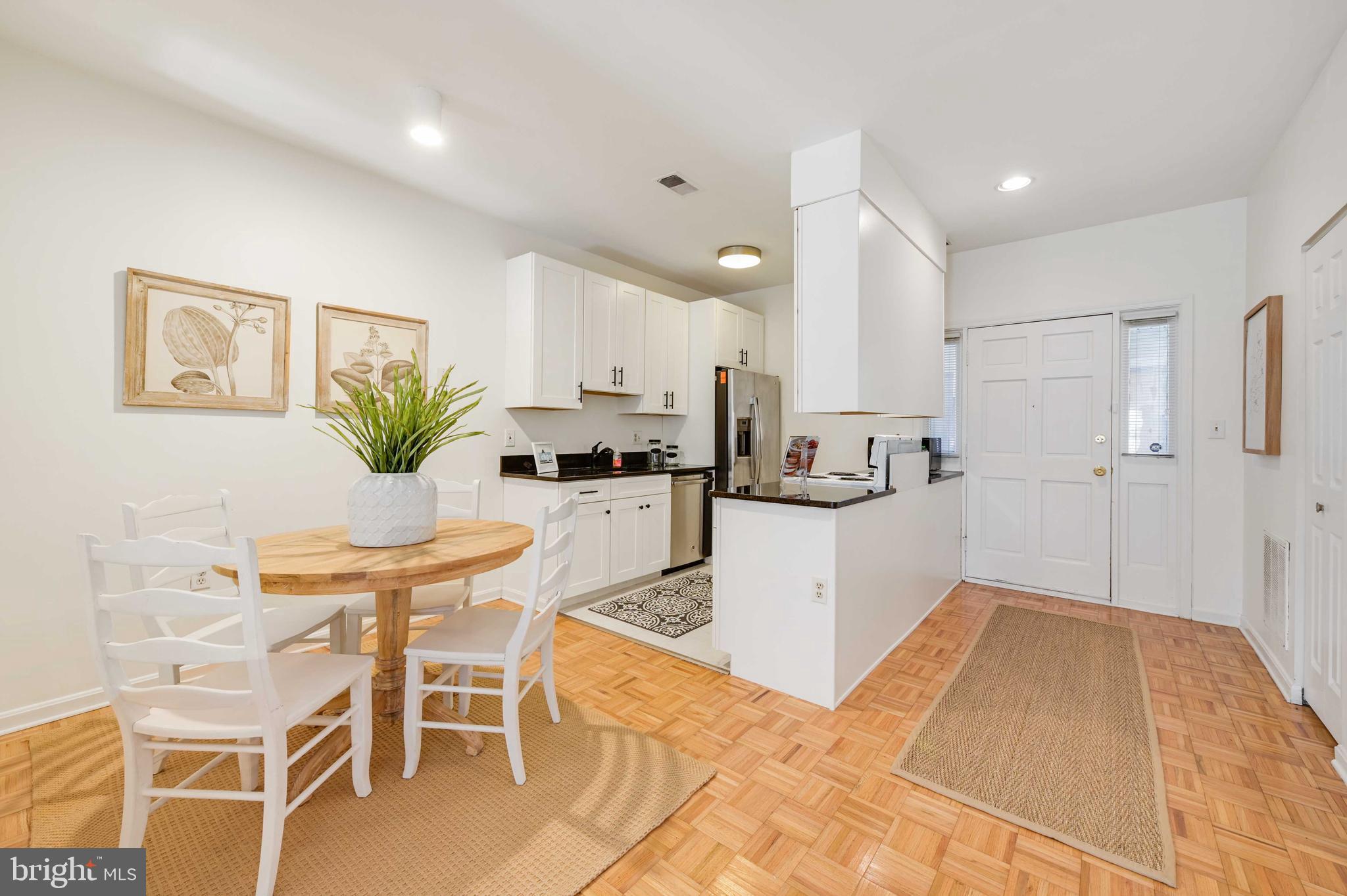 4202 Roland Avenue, Unit 104 Baltimore, MD 21211 - Photo 7 of 37 Bright dining area/kitchen