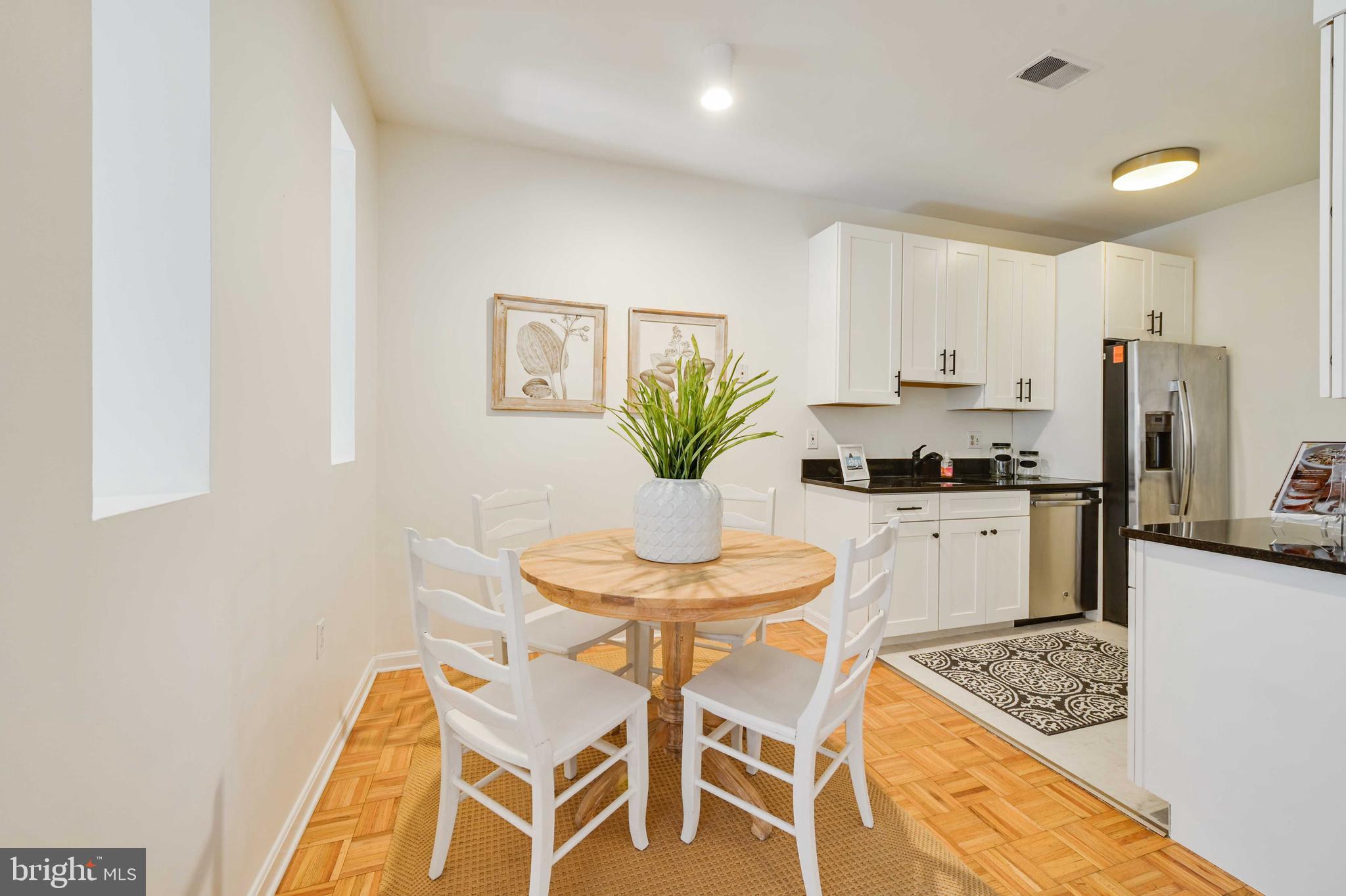 4202 Roland Avenue, Unit 104 Baltimore, MD 21211 - Photo 9 of 37 Dining area off of kitchen
