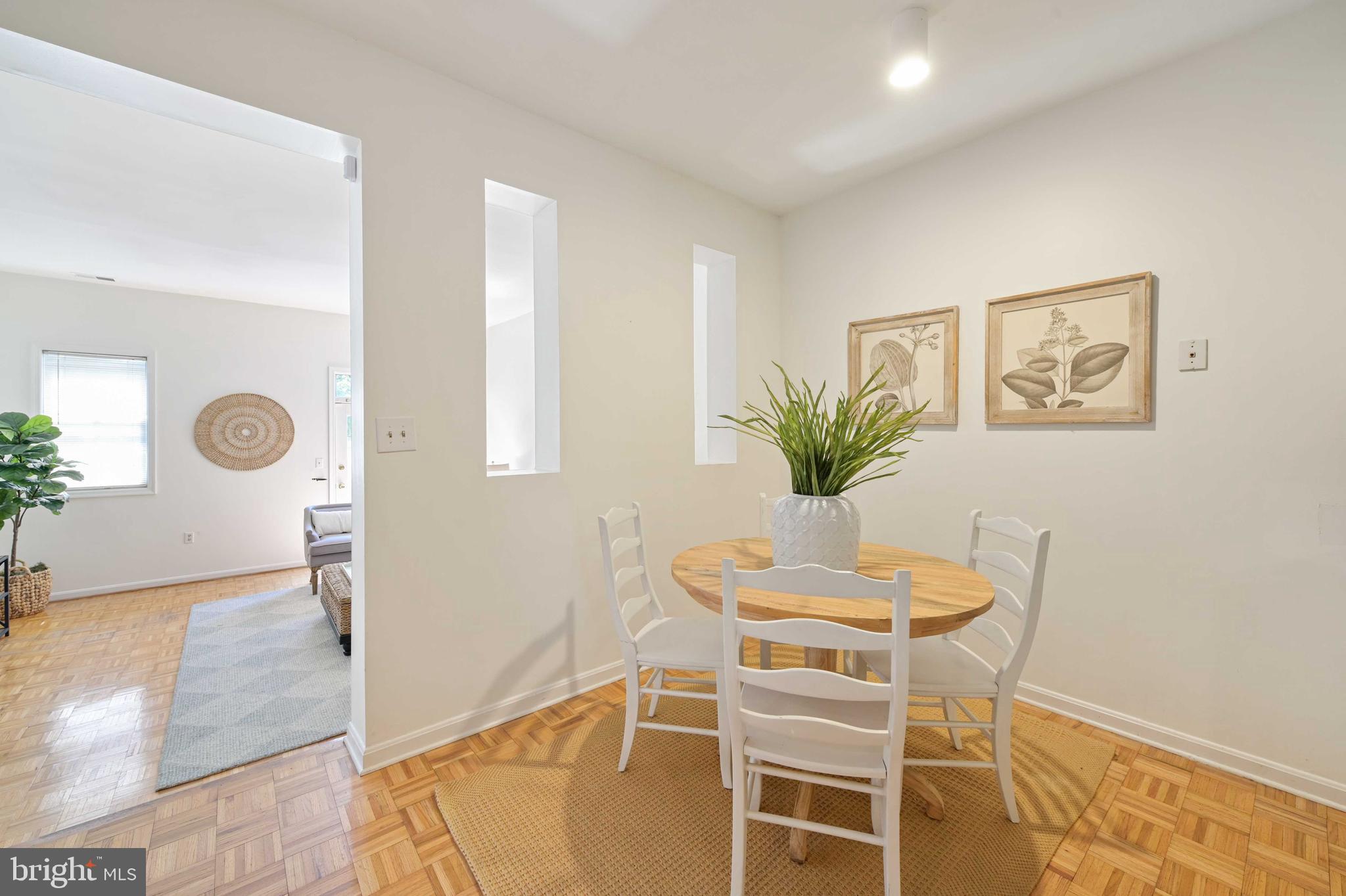 4202 Roland Avenue, Unit 104 Baltimore, MD 21211 - Photo 10 of 37 Dining area looking towards living room