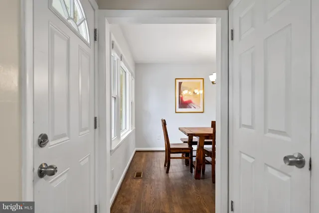 a kitchen with stainless steel appliances granite countertop a stove top oven a sink dishwasher and a refrigerator