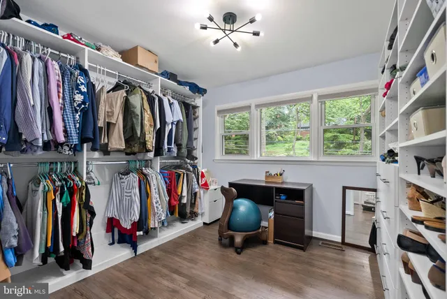 a bathroom with a sink toilet and vanity