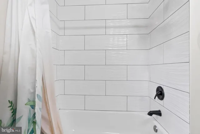 a view of a workspace with furniture and a workspace