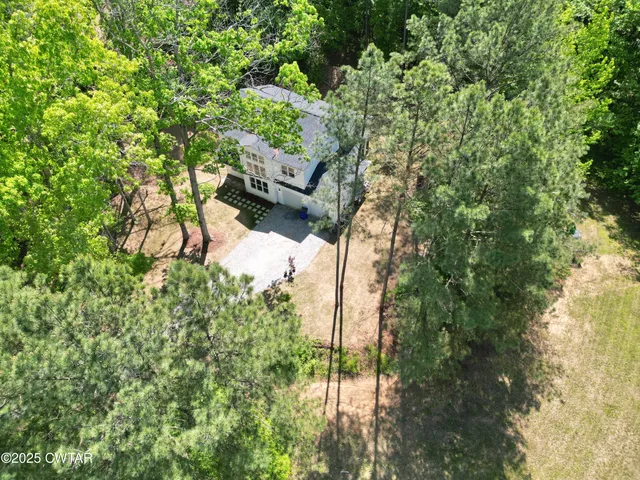 a room with chair and a window