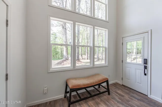 a living room with furniture or couch and a window