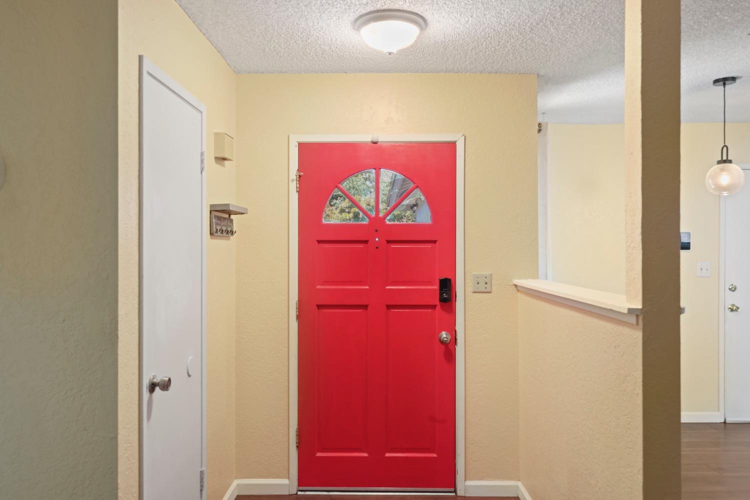 948 Harvard Avenue Clovis, CA 93612 - Photo 3 of 26 a view of a hallway with a door