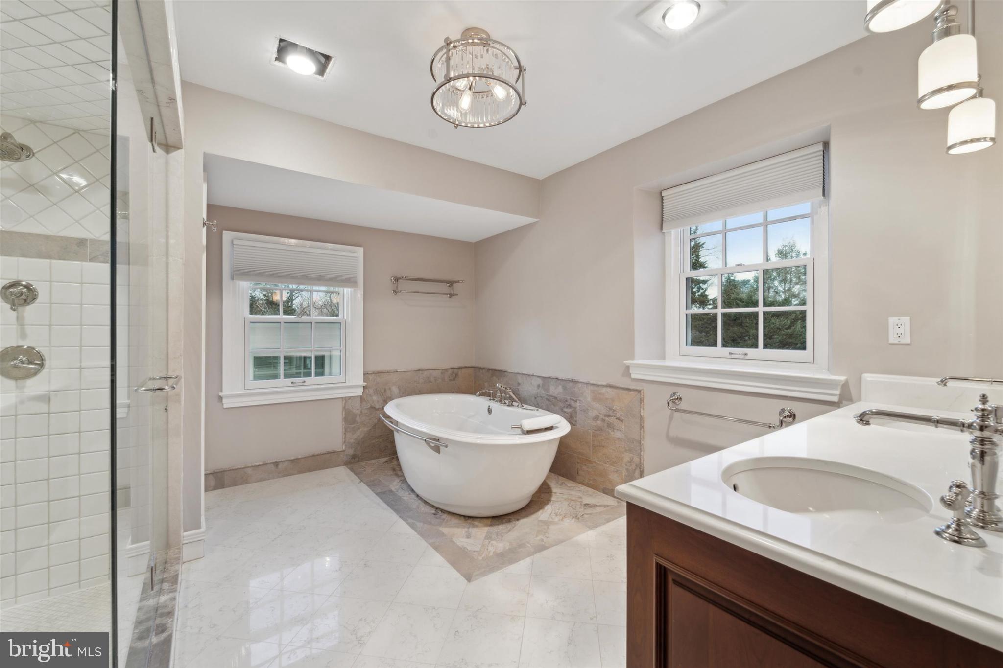 101 East Brookhaven Road Wallingford, PA 19086 - Photo 26 of 60 a bathroom with a sink and a mirror