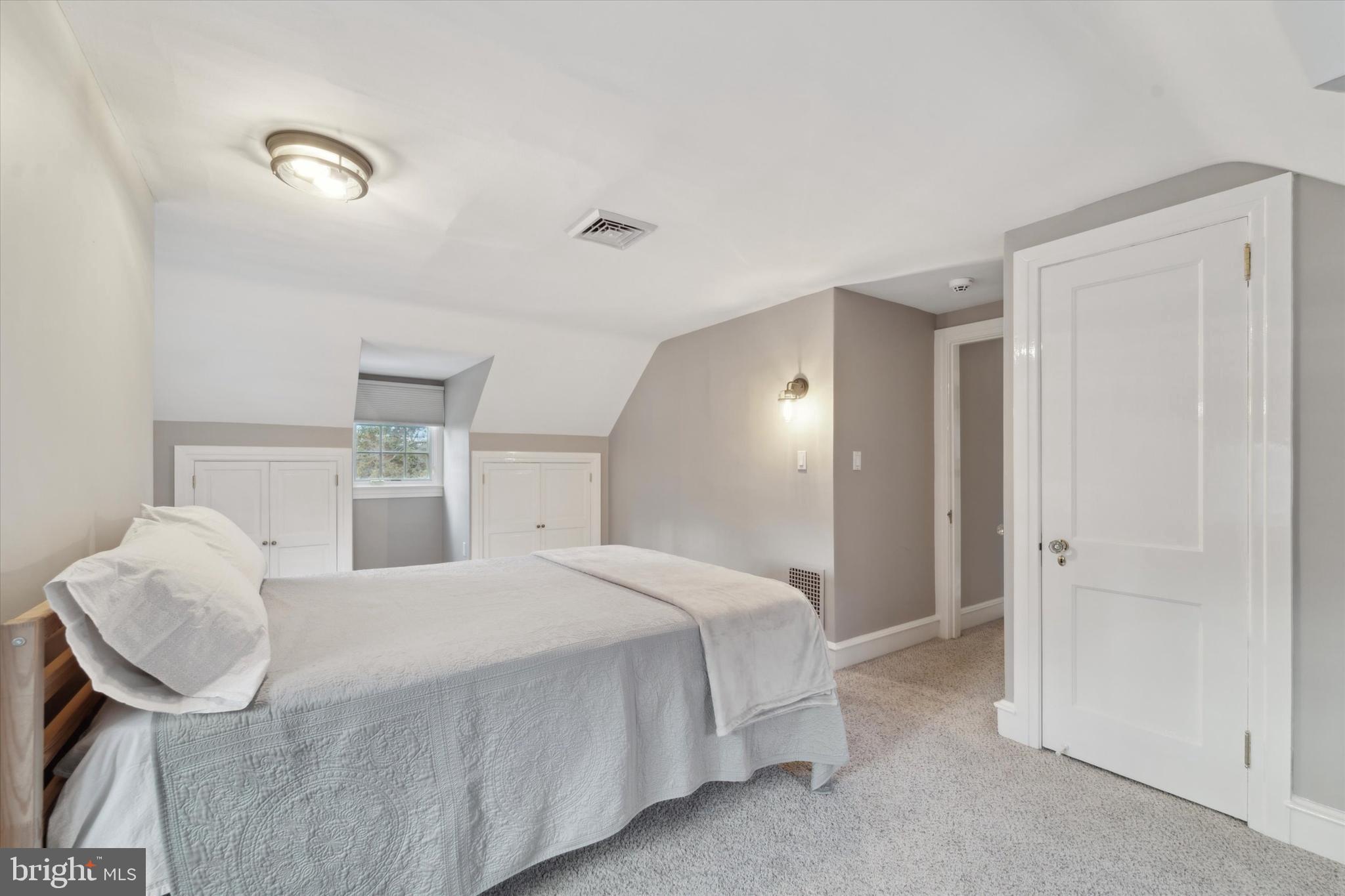 101 East Brookhaven Road Wallingford, PA 19086 - Photo 33 of 60 a bedroom with a bed and a dresser