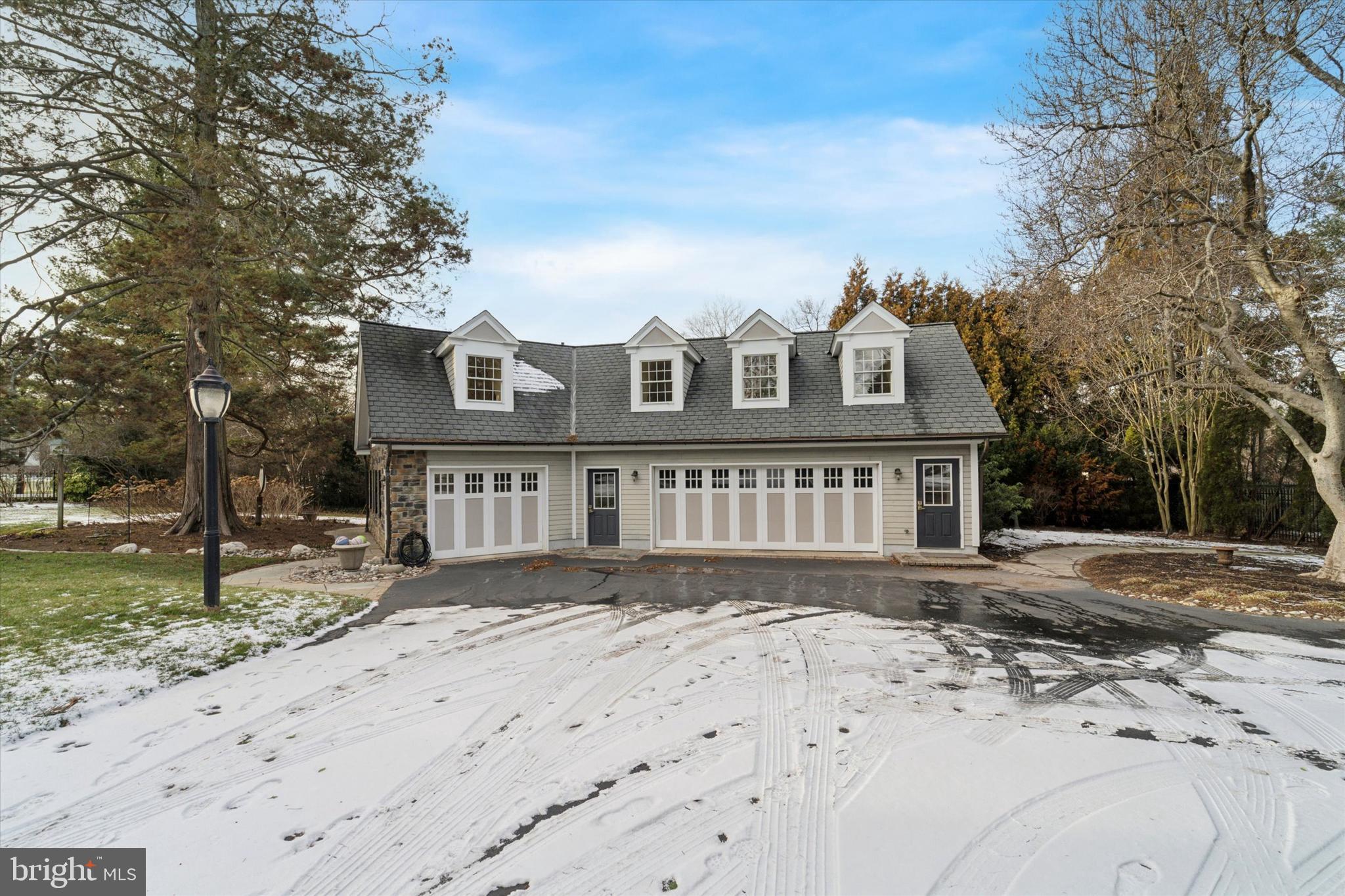 101 East Brookhaven Road Wallingford, PA 19086 - Photo 40 of 60 a front view of a house with a yard
