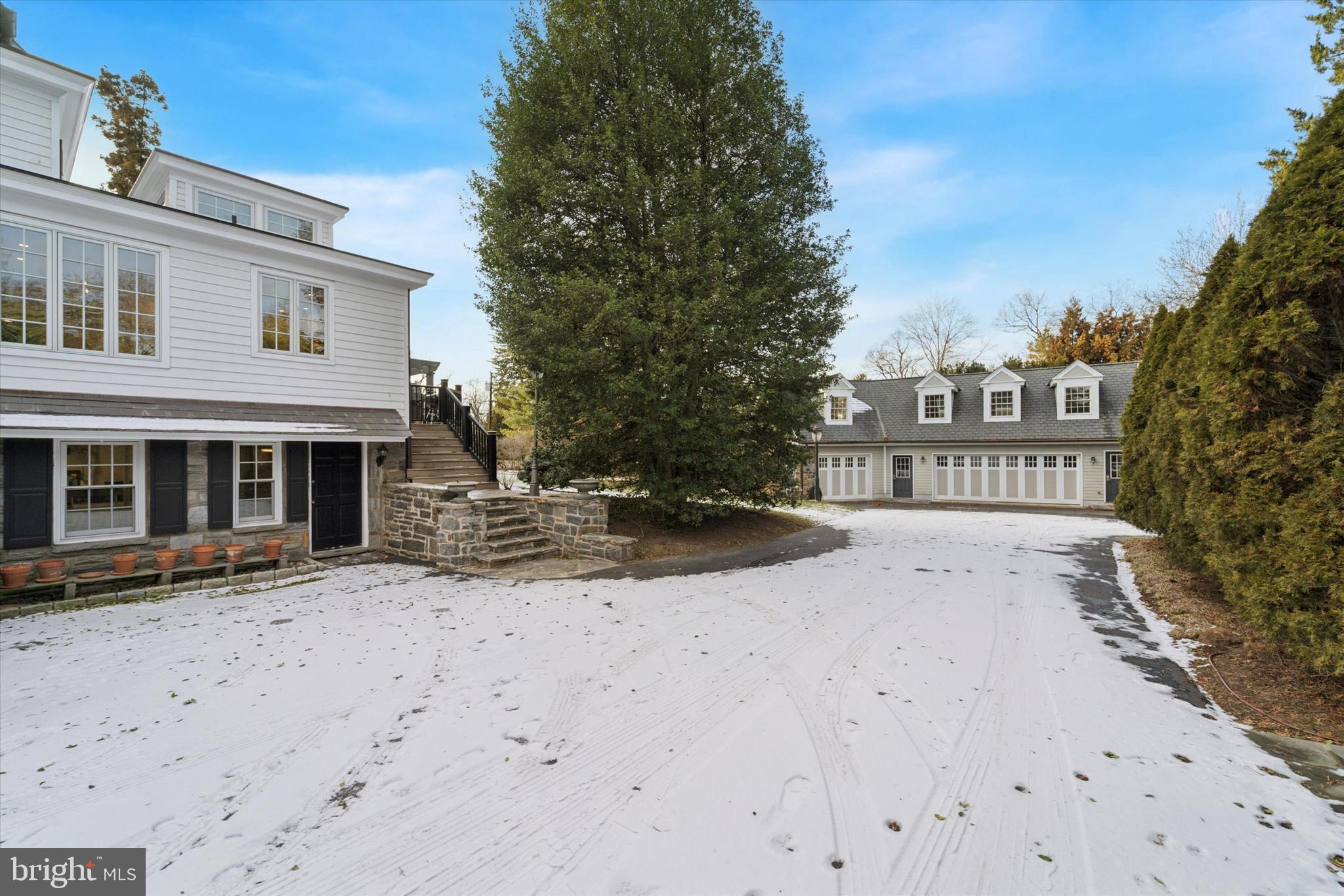 101 East Brookhaven Road Wallingford, PA 19086 - Photo 51 of 60 a view of a building with a snow on the road