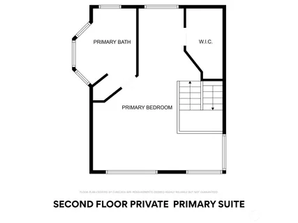 a view of a livingroom with wooden floor and a refrigerator