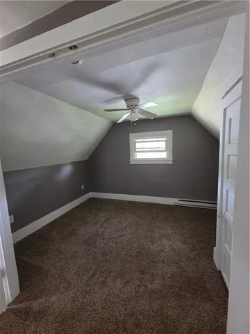 a view of a empty room with a window