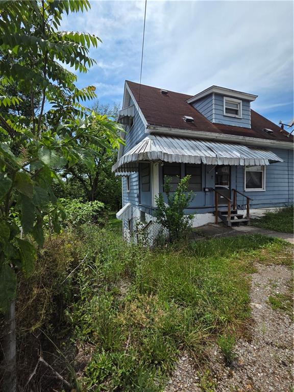 509 Forest Street Monessen, PA 15062 - Photo 24 of 25 a front view of house with yard and green space
