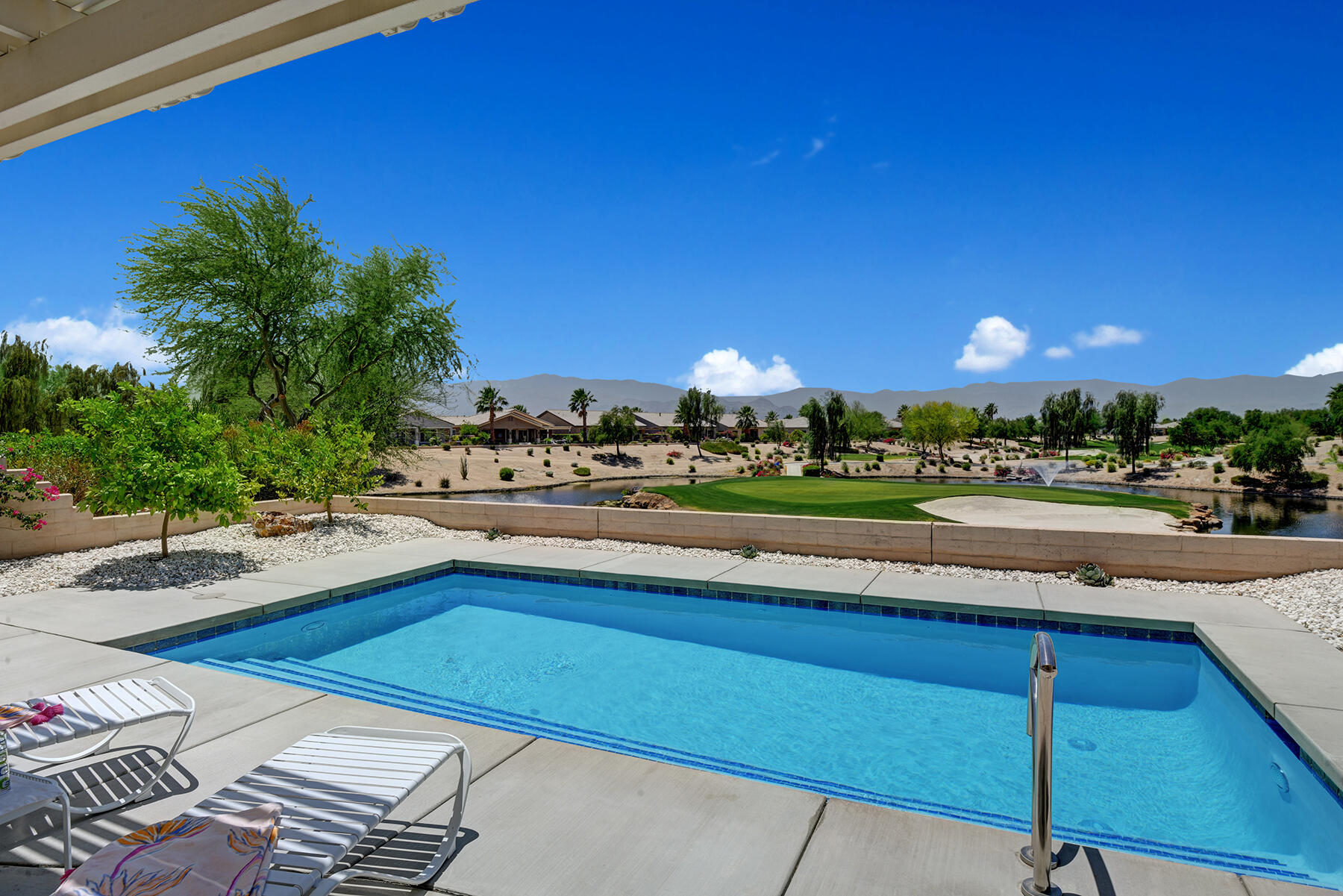 a view of a swimming pool and outdoor space