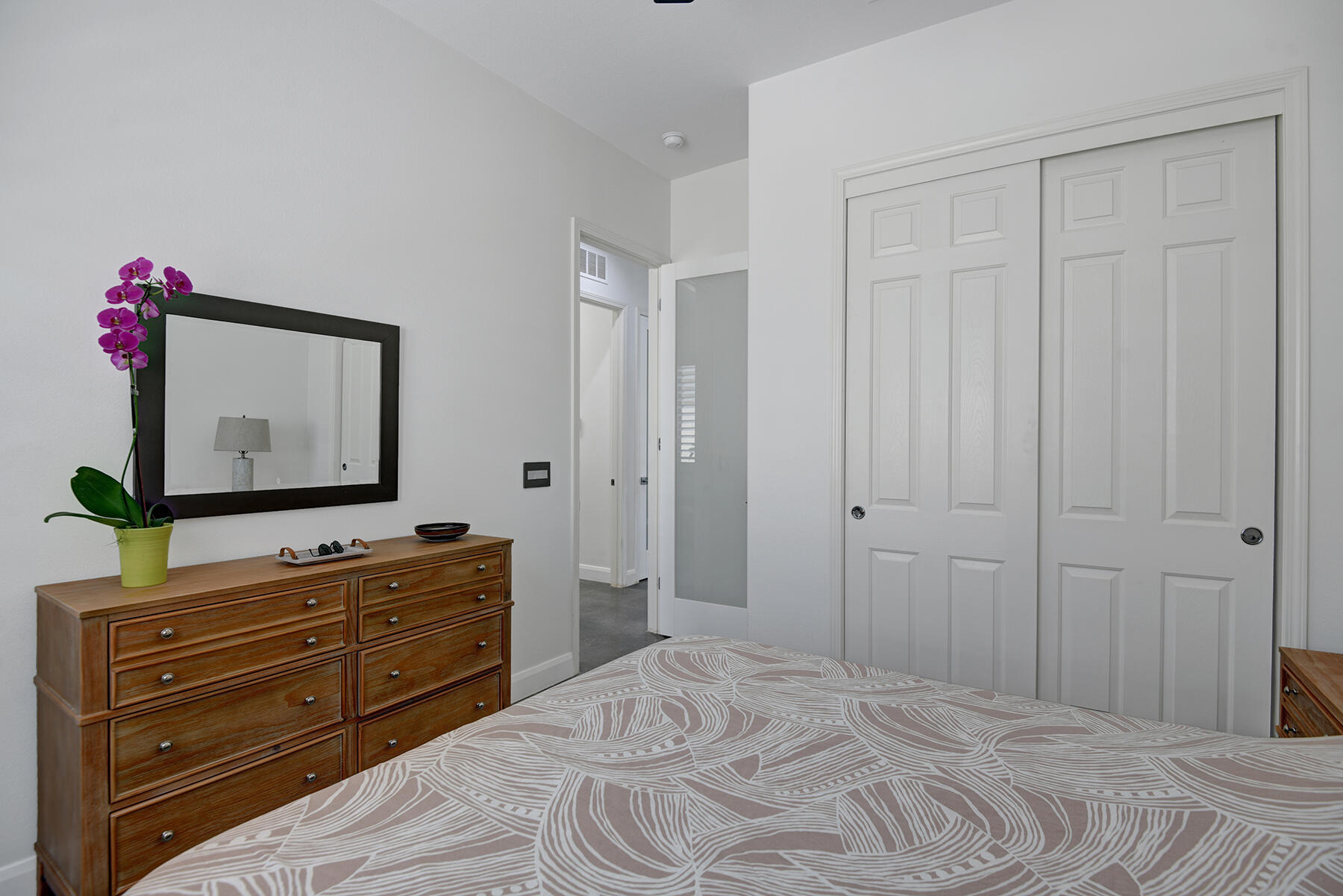 81881 Avenida Estuco Indio, CA 92203 - Photo 16 of 33 a bedroom with a bed and a flat screen tv