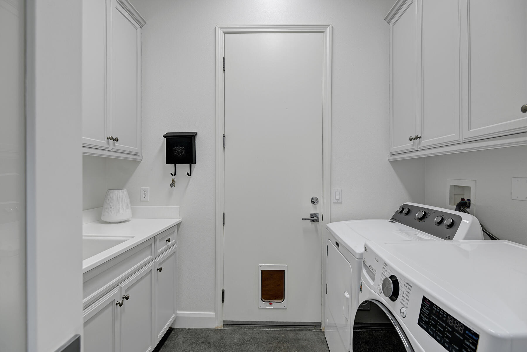 81881 Avenida Estuco Indio, CA 92203 - Photo 24 of 33 a utility room with dryer and washer