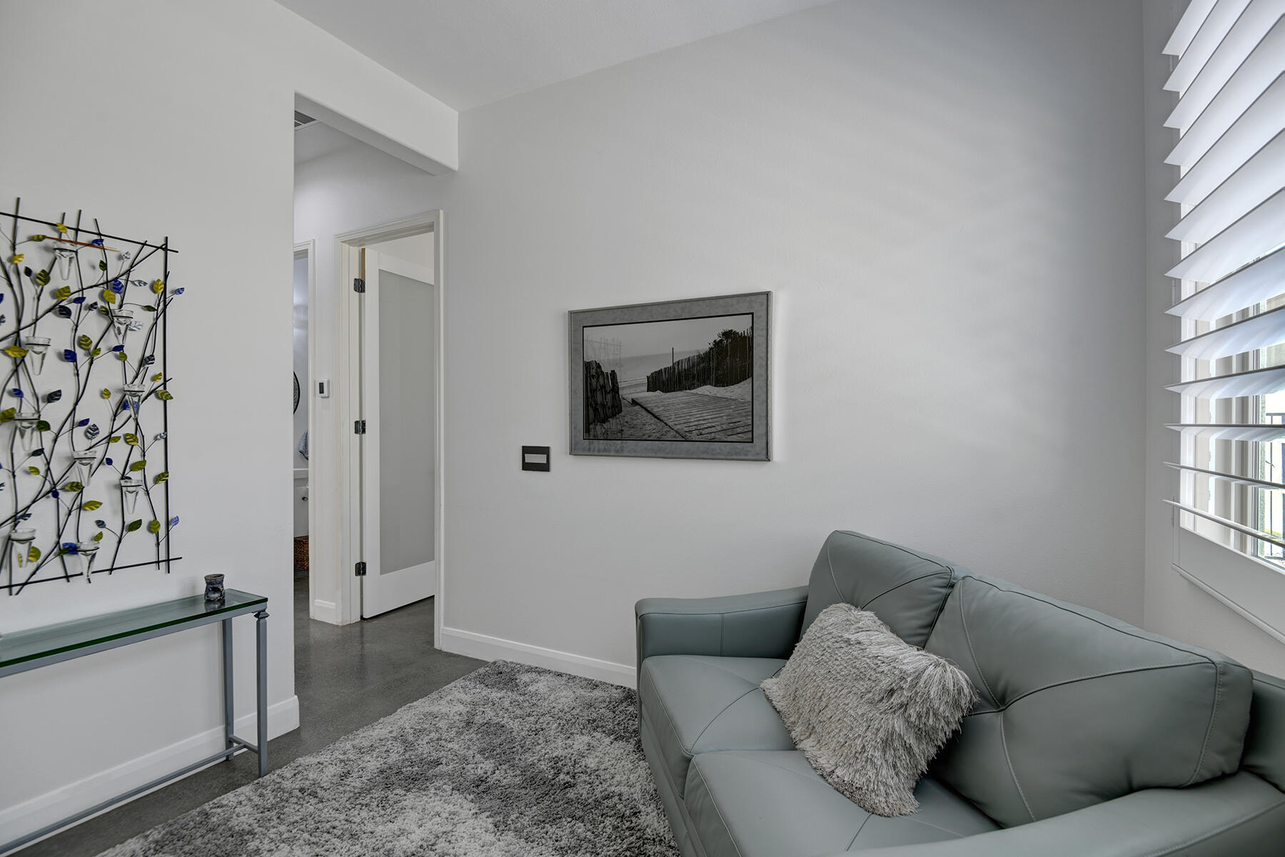 81881 Avenida Estuco Indio, CA 92203 - Photo 26 of 33 a living room with furniture and window
