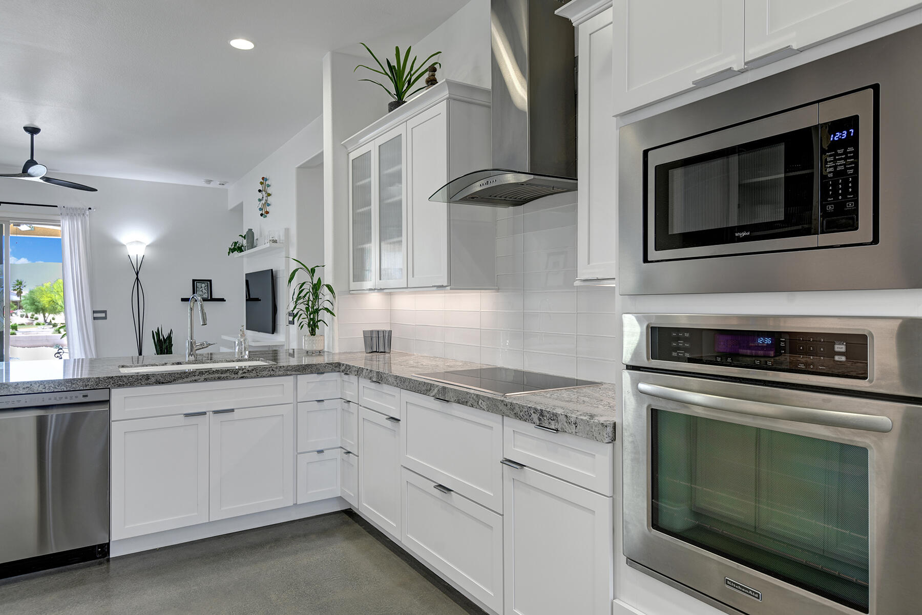 81881 Avenida Estuco Indio, CA 92203 - Photo 8 of 33 a kitchen with cabinets stainless steel appliances and a sink