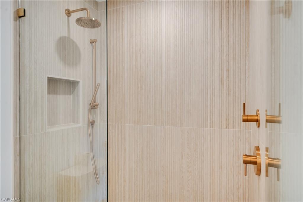 3695 El Segundo Court Naples, FL 34109 - Photo 10 of 37 Bathroom with a tile shower