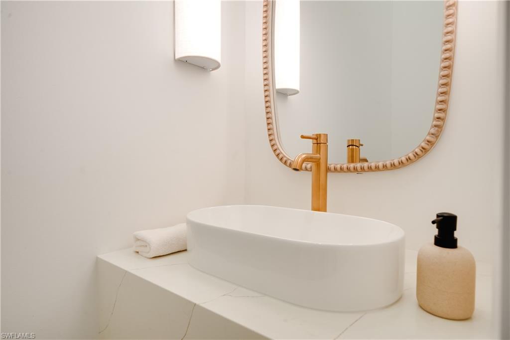 3695 El Segundo Court Naples, FL 34109 - Photo 26 of 37 Bathroom featuring a sink