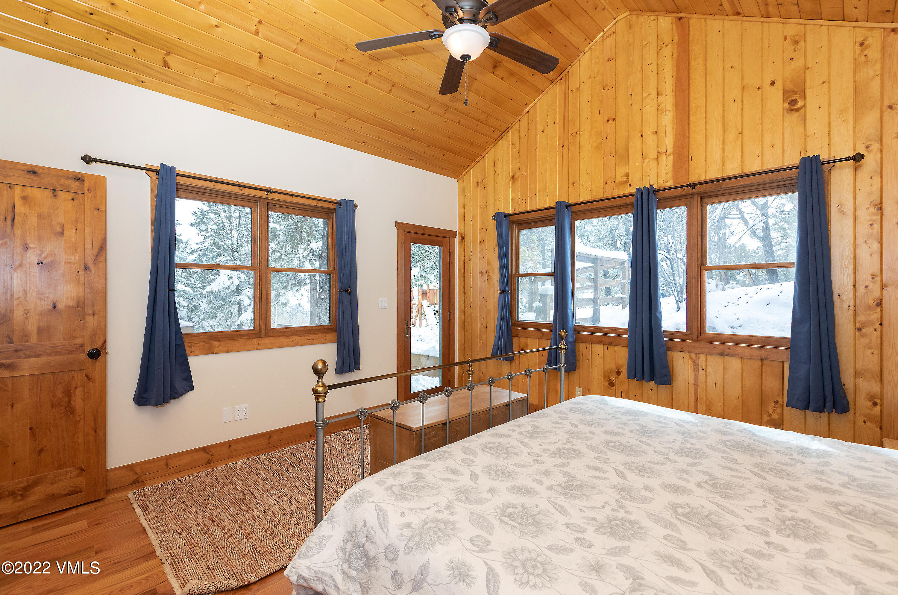 2025 Eby Creek Road Eagle, CO 81631 - Photo 14 of 40 a bedroom with a bed a window and walk in closet