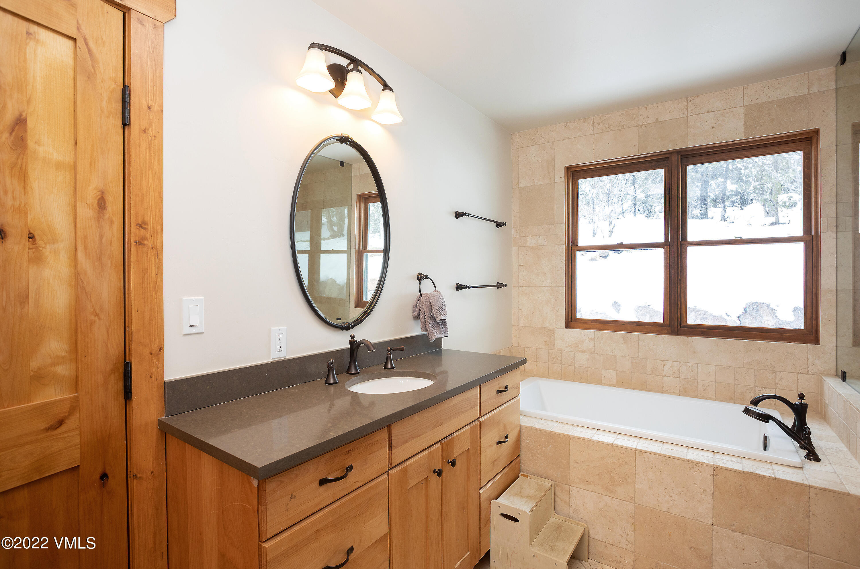 2025 Eby Creek Road Eagle, CO 81631 - Photo 16 of 40 a bathroom with a sink and a mirror