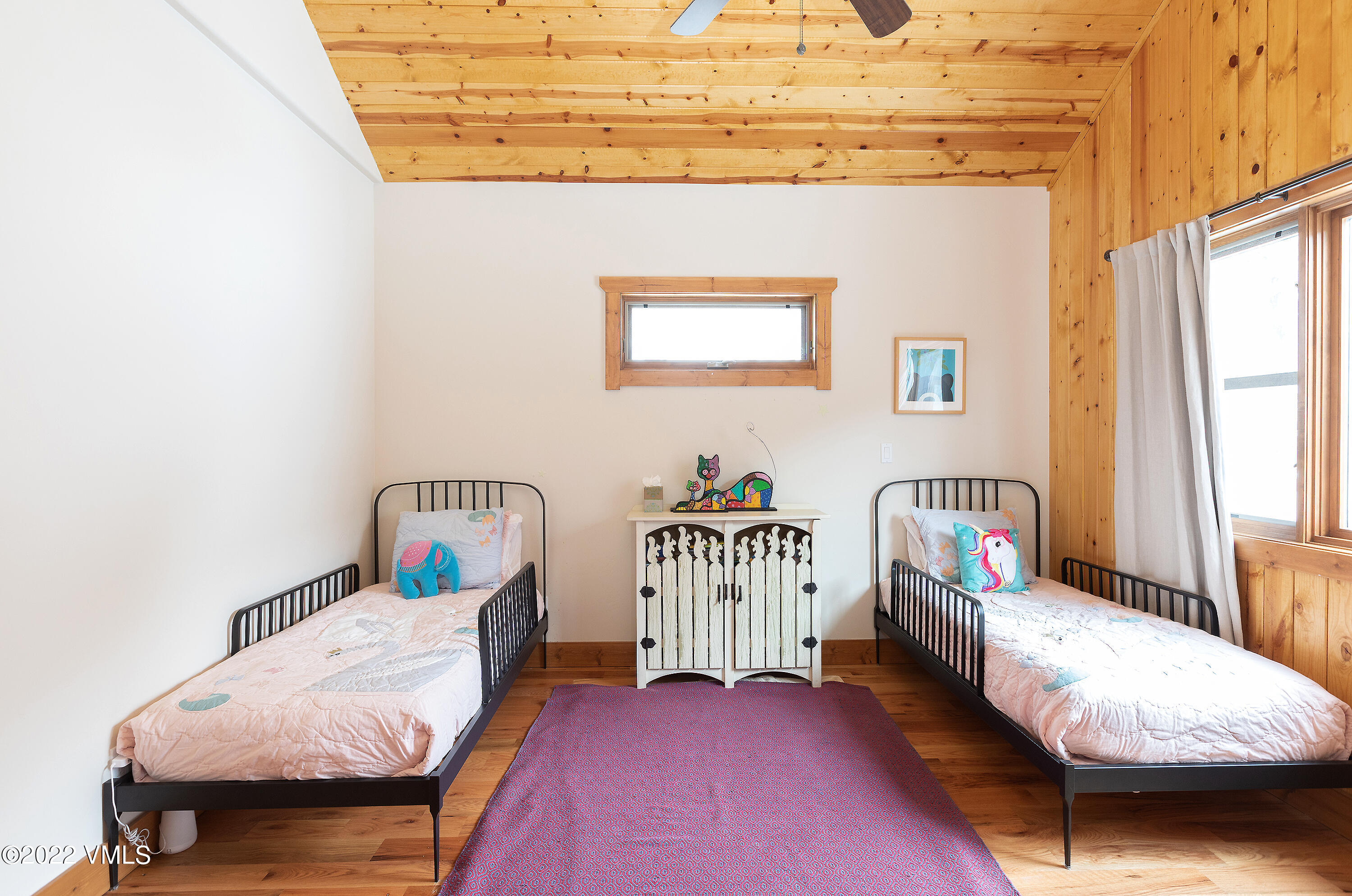 2025 Eby Creek Road Eagle, CO 81631 - Photo 19 of 40 a bedroom with furniture and a window