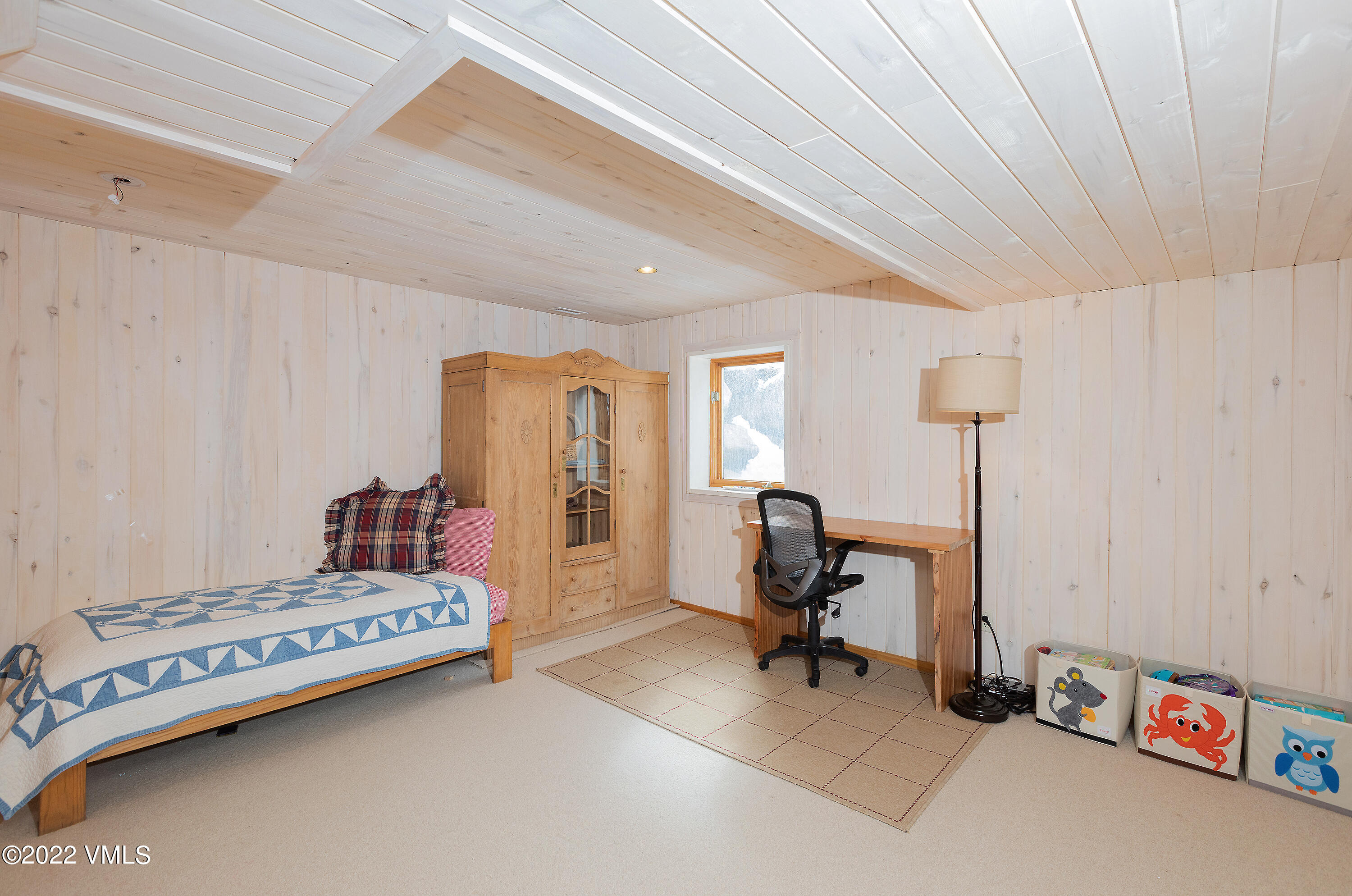 2025 Eby Creek Road Eagle, CO 81631 - Photo 22 of 40 a living room with furniture and a gym machine
