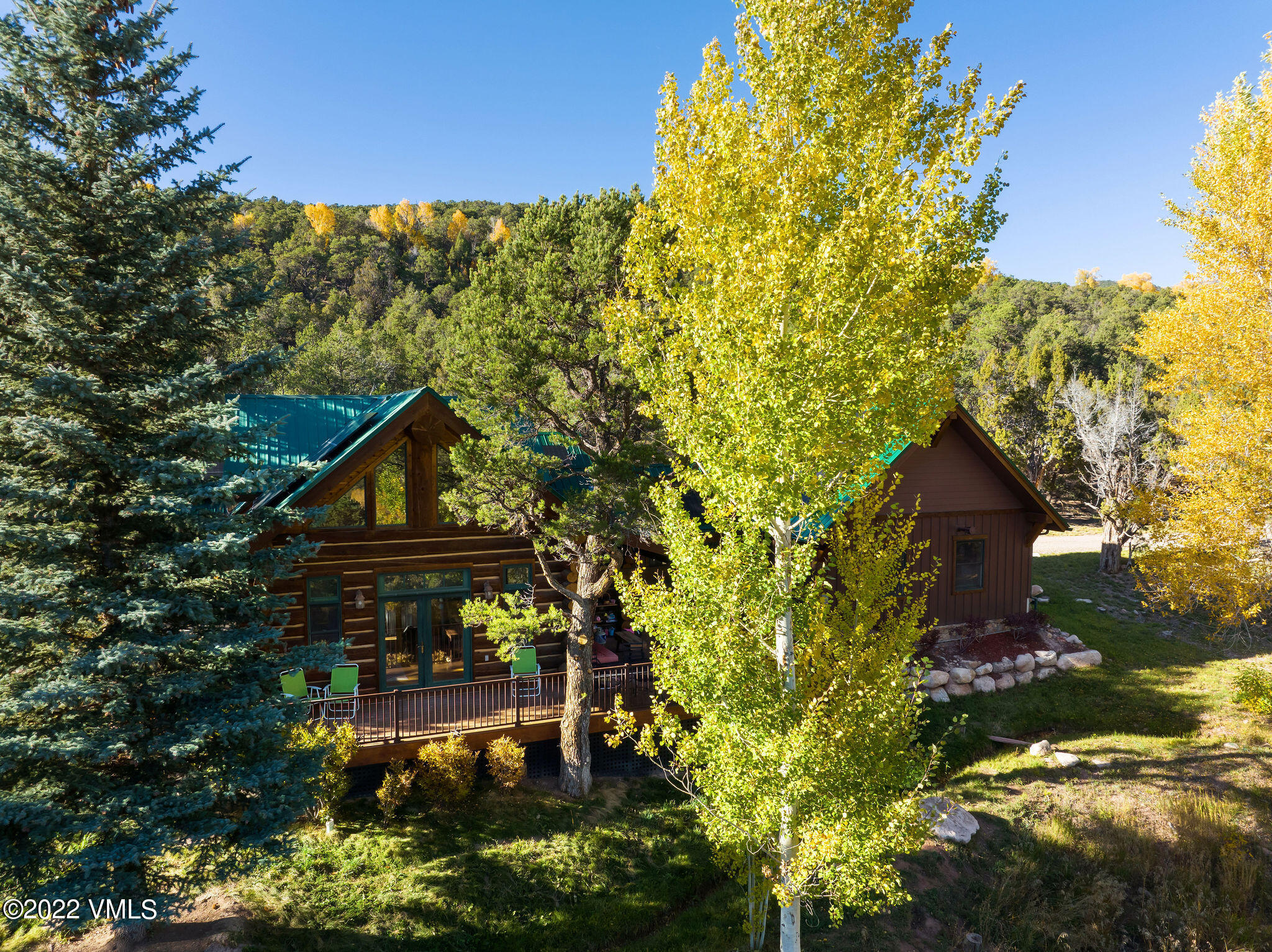 2025 Eby Creek Road Eagle, CO 81631 - Photo 31 of 40 a backyard of a house with lots of green space