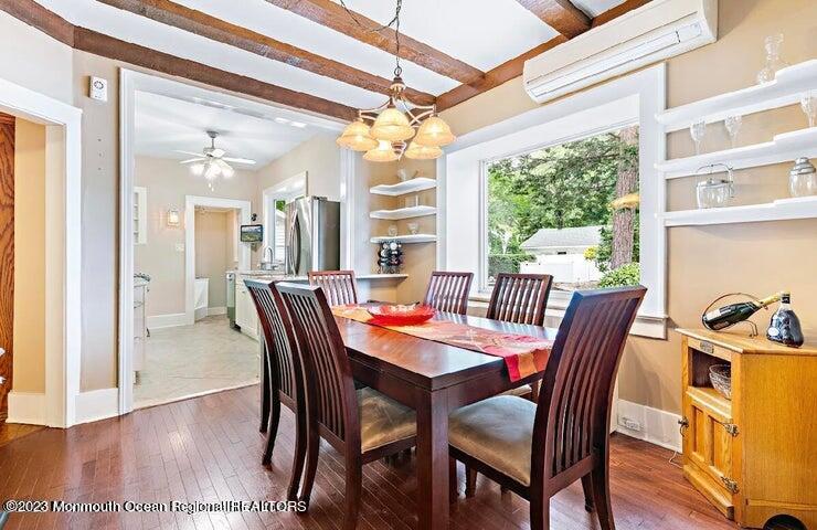214 Cliftwood Road Oakhurst, NJ 07755 - Photo 12 of 61 a view of a dining room with furniture window and wooden floor