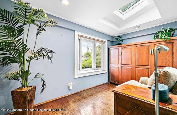 214 Cliftwood Road Oakhurst, NJ 07755 - Photo 14 of 61 a bedroom with a bed and a window