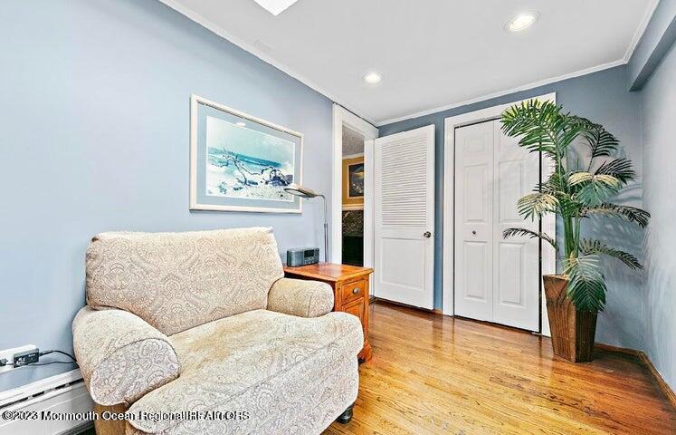 214 Cliftwood Road Oakhurst, NJ 07755 - Photo 15 of 61 a living room with furniture and a large window