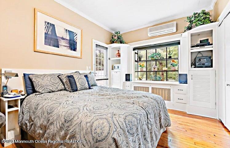 214 Cliftwood Road Oakhurst, NJ 07755 - Photo 20 of 61 a bedroom with bed and a large window