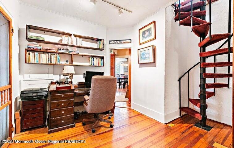 214 Cliftwood Road Oakhurst, NJ 07755 - Photo 24 of 61 a view of a workspace with furniture and wooden floor