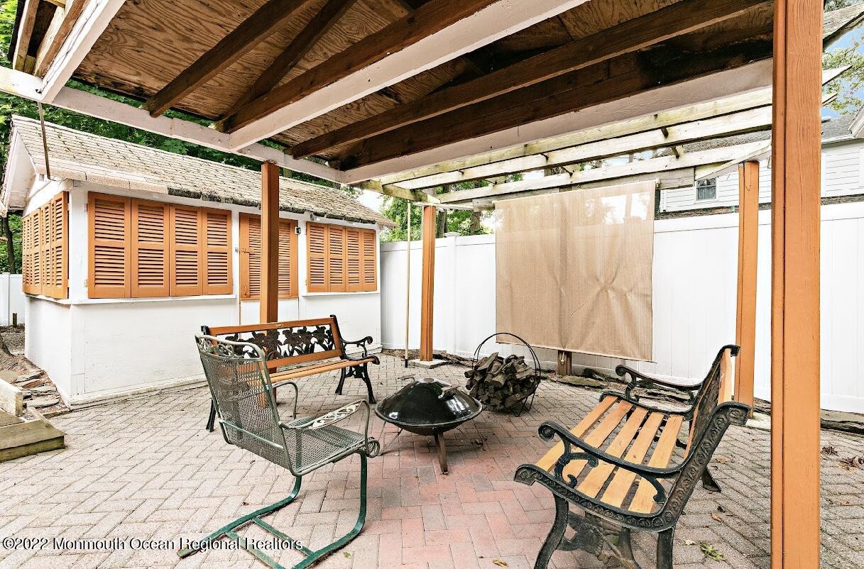 214 Cliftwood Road Oakhurst, NJ 07755 - Photo 47 of 61 a view of a chairs and table in the balcony