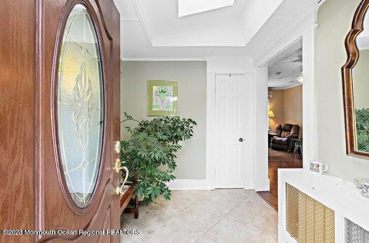 214 Cliftwood Road Oakhurst, NJ 07755 - Photo 5 of 61 a view of a bathroom with mirror and door