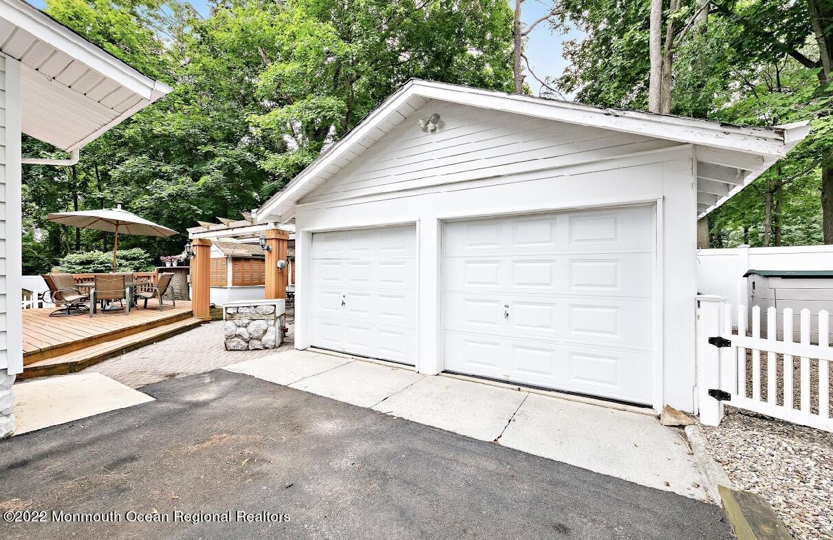 214 Cliftwood Road Oakhurst, NJ 07755 - Photo 61 of 61 a view of a house with a garage