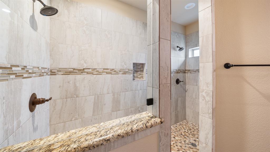 1401 Ridgebriar Drive Kaufman, TX 75142 - Photo 13 of 26 Walk in shower featuring two shower heads